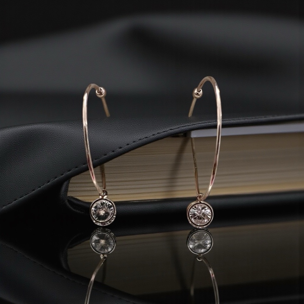 Elegant Rose Garden Gold Hoop Earrings with a Dangle Cubic Zirconia stone.